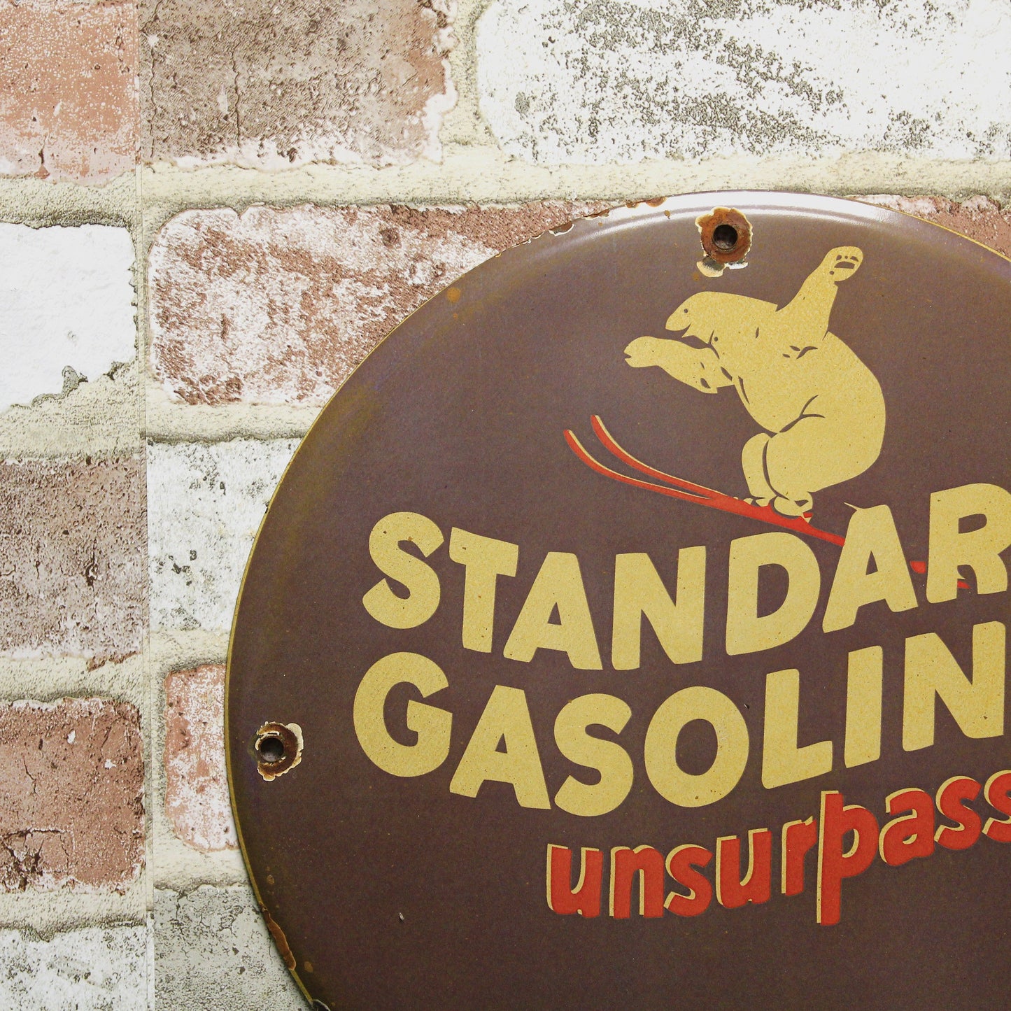 Standard Gasoline Polar Bear Ski Unsurpassed Porcelain Enamel Sign (12in)