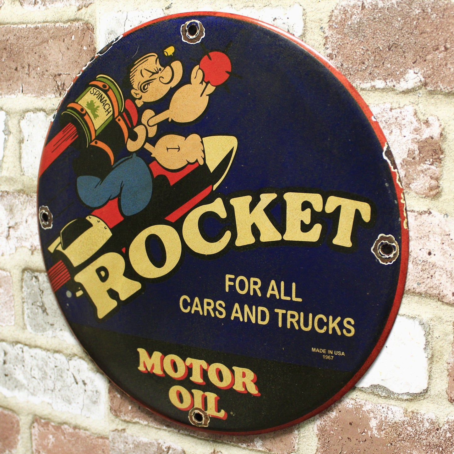 Rocket Motor Oil with Popeye Porcelain Enamel Sign (12in)