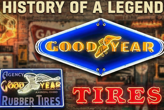Vintage Goodyear neon signs displayed on a brick wall, featuring the classic Wingfoot logo, a blue porcelain-style diamond Goodyear sign, an early “Good Year Rubber Tires” sign, and bold red neon “TIRES” lettering under the headline “History of a Legend.”