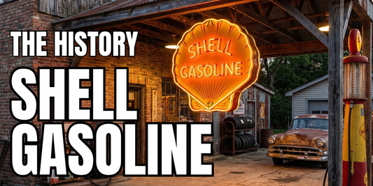 Vintage Shell Gasoline neon sign glowing outside a historic gas station with classic car and fuel pump