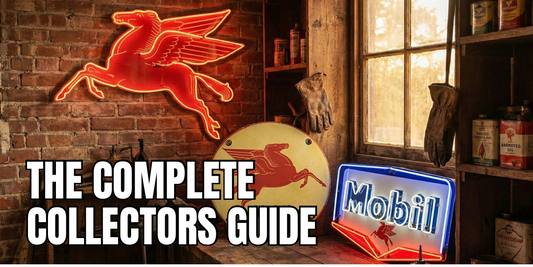 Vintage Mobil Pegasus neon signs displayed in an old brick garage — glowing red Pegasus wall neon, round yellow Pegasus porcelain sign, and blue-white Mobil arrow neon sign