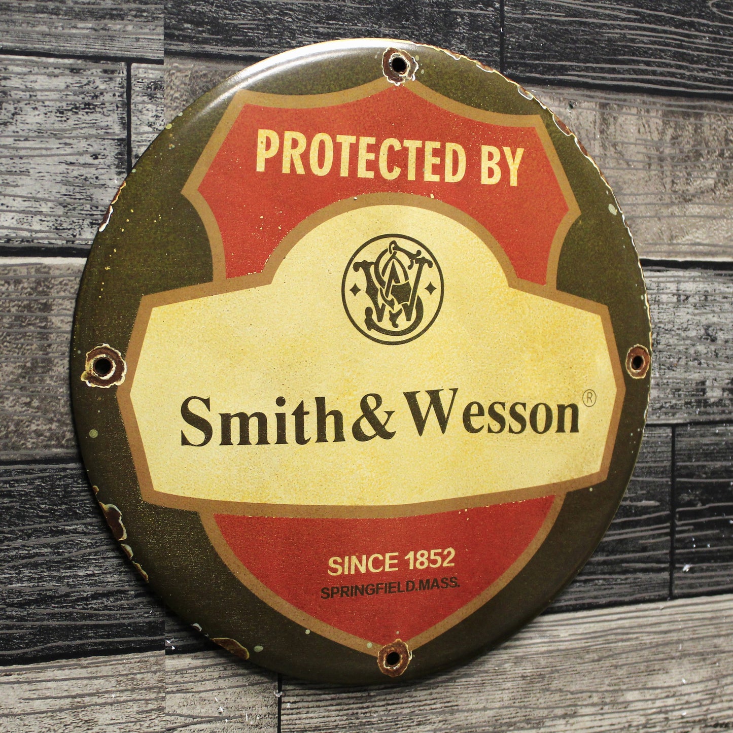 Protected by Smith & Wesson Porcelain Enamel Sign (12in)