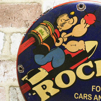 Rocket Motor Oil with Popeye Porcelain Enamel Sign (12in)