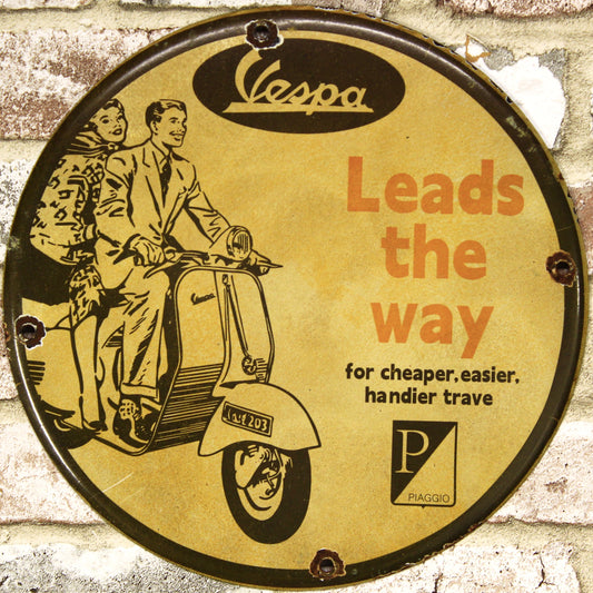 Vespa Leads the Way Porcelain Enamel Sign (12in)