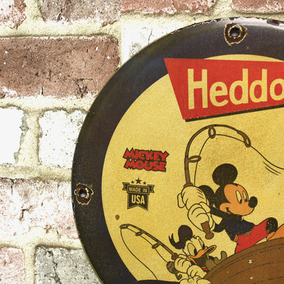 Heddon Catch Em All with Mickey & Donald Porcelain Enamel Sign (12in)