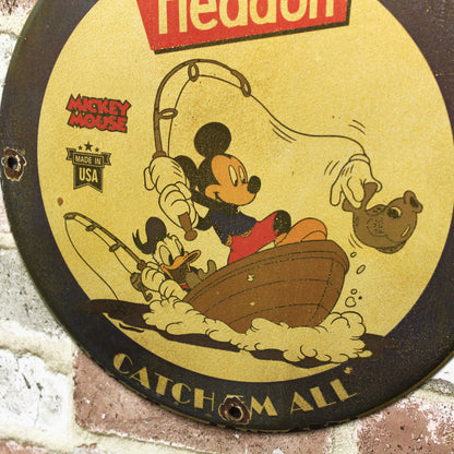 Heddon Catch Em All with Mickey & Donald Porcelain Enamel Sign (12in)