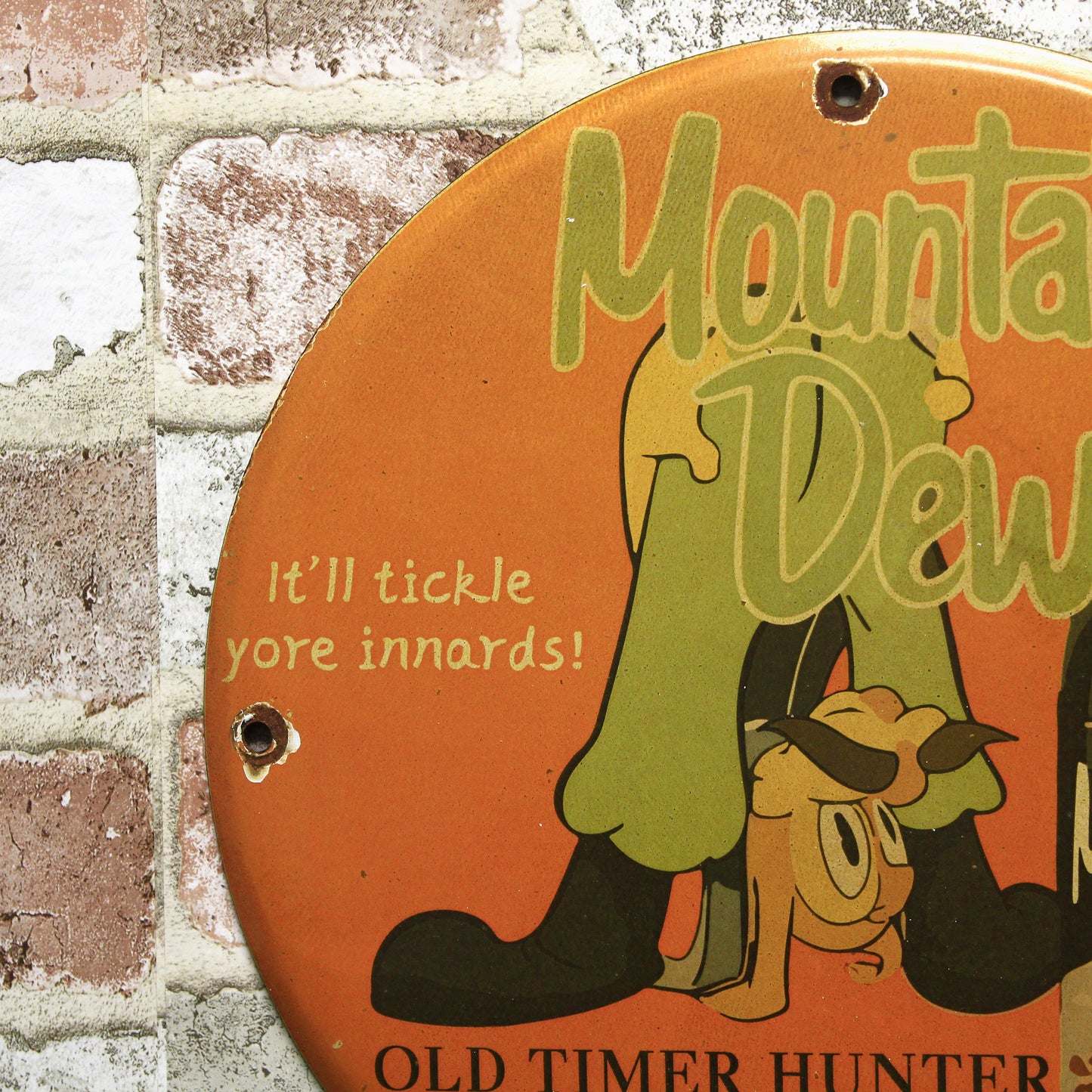 Mountain Dew It'll Tickle Your Innards Porcelain Enamel Sign (12in)