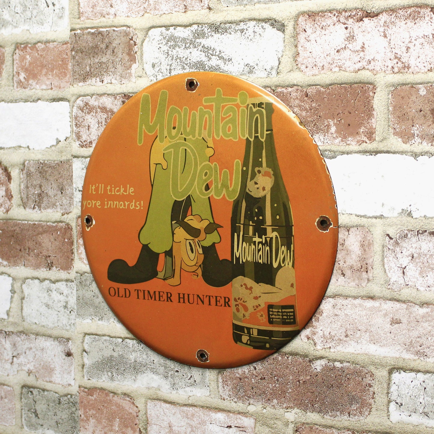 Mountain Dew It'll Tickle Your Innards Porcelain Enamel Sign (12in)