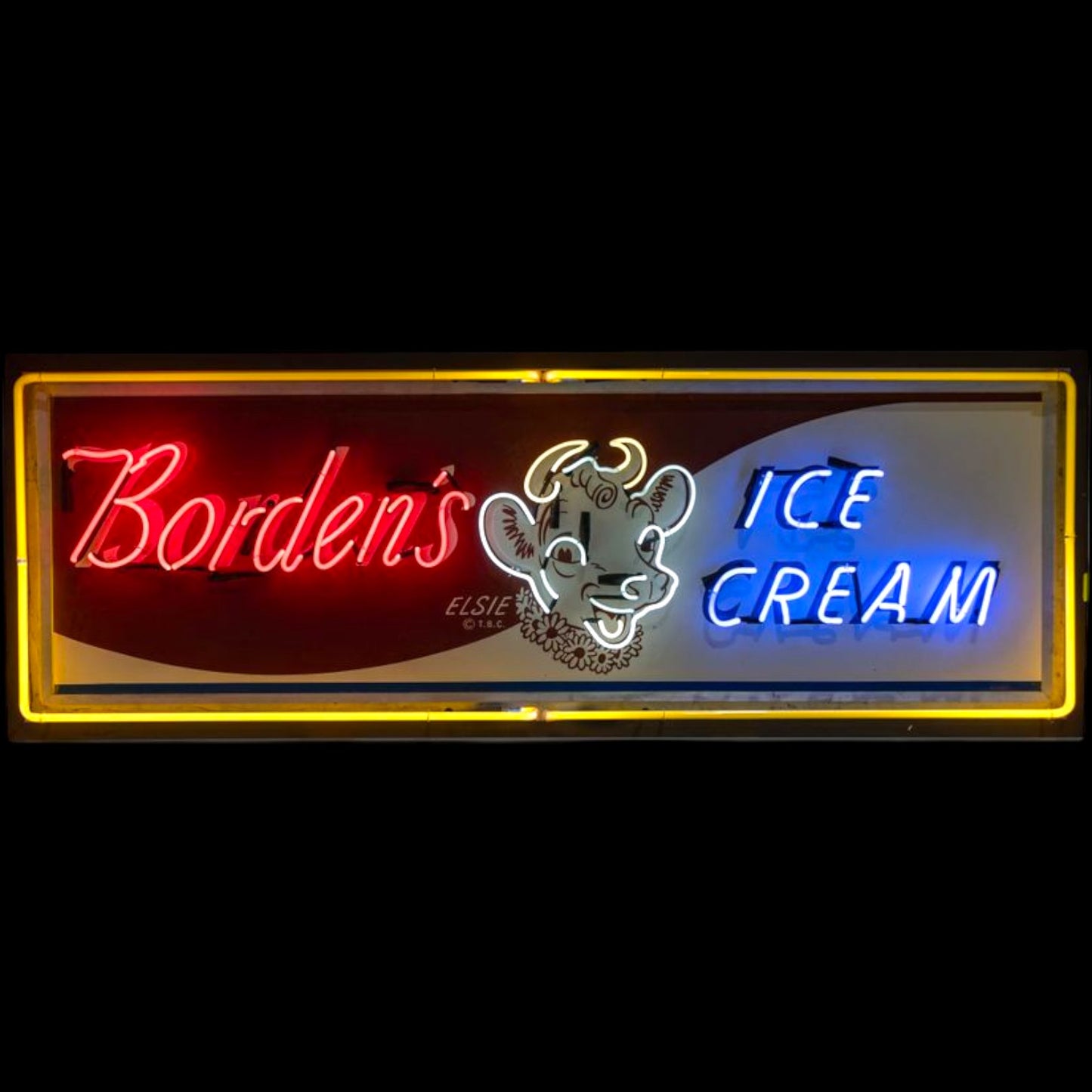 Borden’s Ice Cream neon porcelain sign with red and blue neon lettering and Elsie the Cow artwork