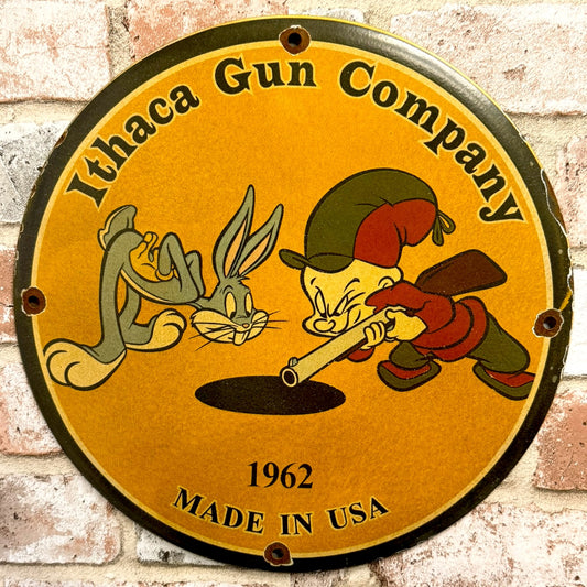 Ithaca Gun Company Porcelain Sign with Nostalgic Elmer Fudd + Bugs Bunny Vintage Advertisement
