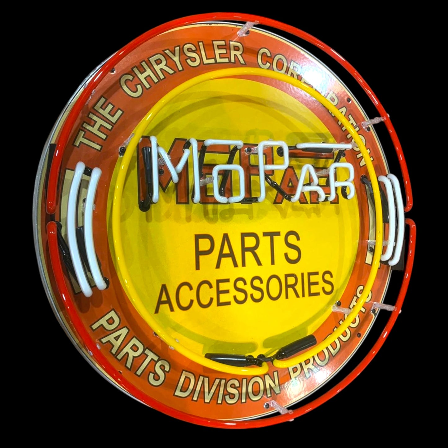 Side angle of Mopar neon sign with visible porcelain enamel detail and vintage lettering