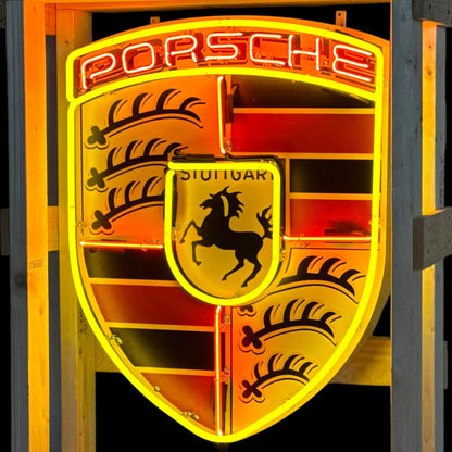 Neon Porsche logo on a dark background