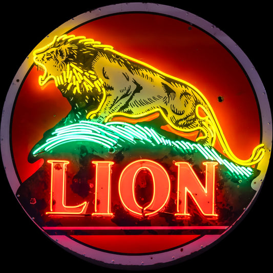 Neon sign of a lion with the word 'LION' below it on a red background.