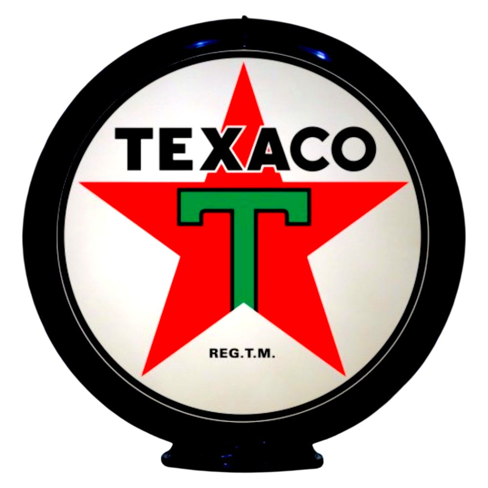 Texaco logo on a round, illuminated sign with a red star and green 'T'.