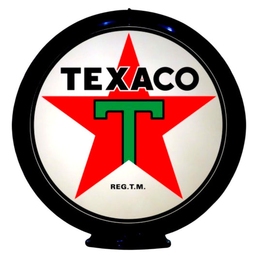 Texaco logo on a round, illuminated sign with a red star and green 'T'.