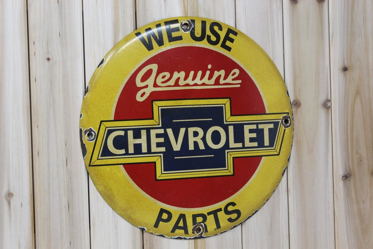 We Use Genuine Chevrolet Parts 12in Porcelain Enamel Sign - PORCELAIN ADVERTISING - Sign