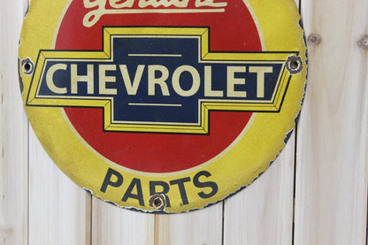 We Use Genuine Chevrolet Parts 12in Porcelain Enamel Sign - PORCELAIN ADVERTISING - Sign